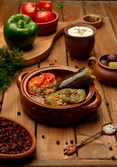 azerbaijai dish three sisters dolma with stuffed aubergine, bell pepper and tomato