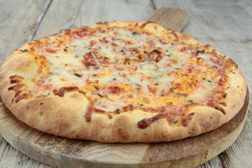 pizza on the wood table