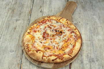pizza on the wood table