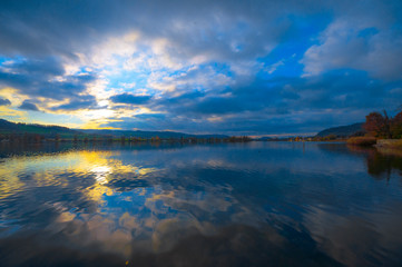 Autumn evening on Lake Constance. On the horizon ends the lake, where the river Rhine begins its course.