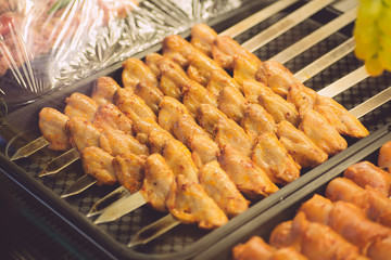 Chicken kebab in the kitchen of an oriental restaurant. Kebab with chicken wings. Oriental and Muslim Street Food