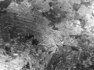 Fototapeta na wymiar Grunge black and white pattern. Monochrome particles abstract texture. Background of cracks