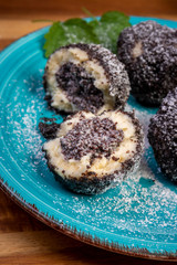 sweet dumplings with poppy seeds and icing sugar