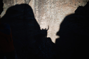 Shadows of people in the mountains