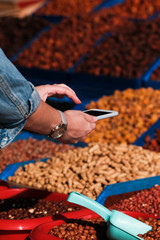 make food photo. Take photos of dried fruits on the phone. Mobile photography