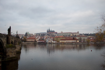  A masterpiece of architecture the famous Charles Bridge in the city of Prague, Czech Republic, on a cloudy morning on the eve of Christmas.