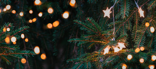 Golden Christmas background with lights and ball.