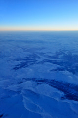 Landscape aerial view from the flight deck of an airliner above Mongolia