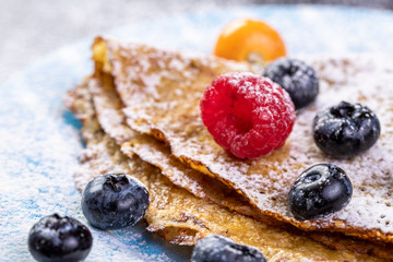 Tasty crepes with blueberries. French crepes