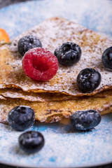 Tasty crepes with blueberries. French crepes