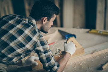 Top above high angle view photo of concentrated handicraftsman work on garage repair old wood furniture use plank wear gloves plaid checkered shirt in home house garage workplace