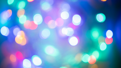 Fototapeta premium Christmas background with blurry lights on the background