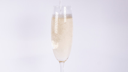 Champagne glass on a white background