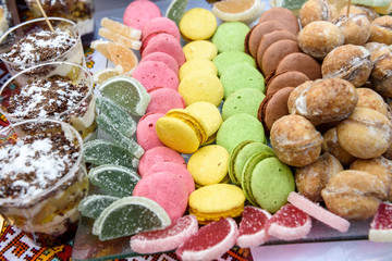 Food. Desserts. Sweet cakes on furshet table in restaurant close up