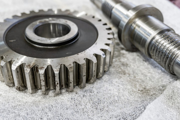 The shaft and gear after processing are ready for assembly.