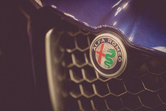 Alfa Romeo logo on a car