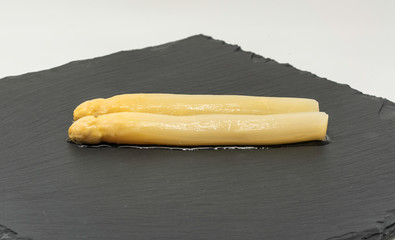White asparagus in different materials
