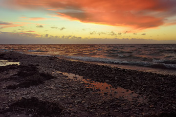 Obraz premium Amazing view of Baltic Sea coast on sunset of winter day.