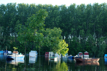 Fototapeta na wymiar Boats on the bank of the river Tamish.