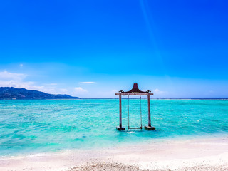 Gili Islands, Indonesia, Asia. Beautiful beach crystal clear water and white sand in an exotic...