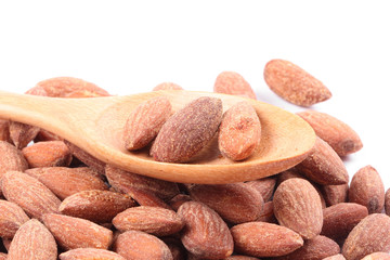 Almonds In Wooden Spoon On White Background