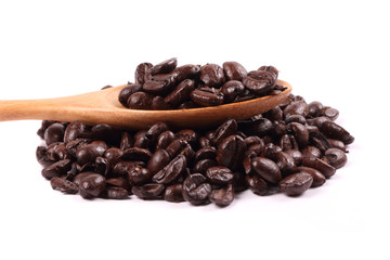 Coffee bean in wooden spoon