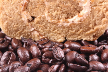 Coffee roll cake with coffee beans