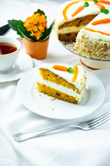 Carrot cake on a white table