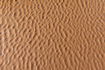 Photograph of small real water waves for texture use.