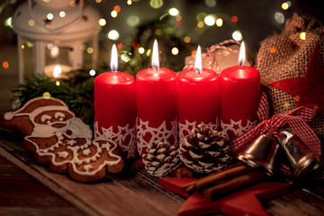 christmas still life with burning candle and decorations 4 th advent