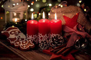 christmas still life with candle and decorations 3th advent