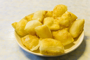 Top view dish of deep fried pillows of rice noodle (Pho chien gion)