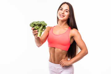 Fitness woman holding broccoli isolated on white background