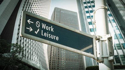 Obraz premium Street Sign to Leisure versus Work