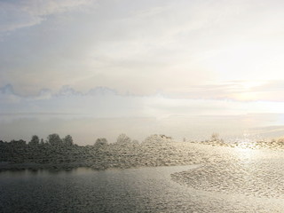 The mixed image of the view of the ice on the surface of the lake and the natural background of the view of the lake shore at the cold spring day at the City Park. 