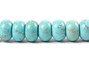 Turquoise stone necklace isolated on white