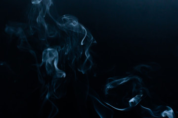 Fototapeta premium Smoke background on black background. Gray smoke texture effect.