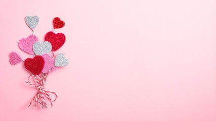 Valentines hearts look like balloons on pink background. Flat lay, top view. Love and romance concept - obrazy, fototapety, plakaty