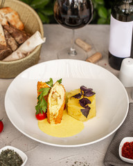 chicken nuggets filled with cream and ham served with pineapple