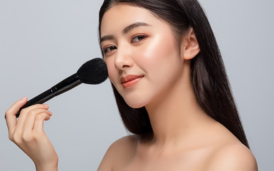 Beautiful young asian woman clean fresh bare skin concept. Asian girl beauty face skincare and health wellness, Facial treatment, Perfect skin, Natural make up isolated on gray background