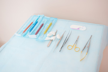 Tools for the periodontist.Scalers in stomatology.Multi-colored dental curettes. Curettes for dental fillings. Dental probes.Bilateral stomatologic probes. Dentistry.