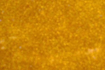 abstract golden background with bokeh lights