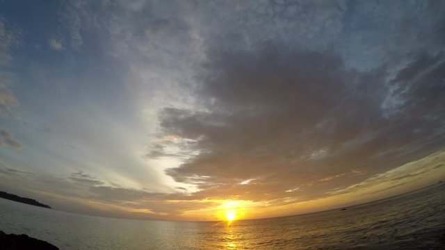 Time lapse video of sunset over ocean