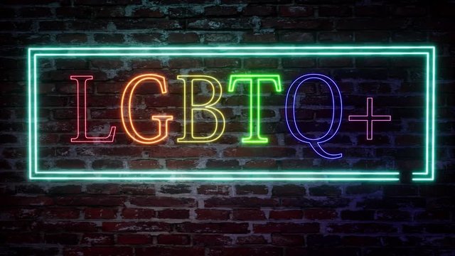 Neon sign with the inscription LGBT on a brick wall background. Colorful pride design. Quote lettering. Rainbow background.. 4k