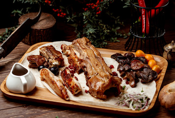kebab platter with lamb, beef, chicken, lamb spleen, narsharab, fresh onion rings
