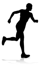 Silhouette runner in a race track and field event