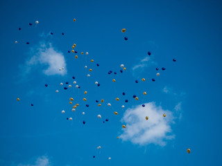 Balloons flying away