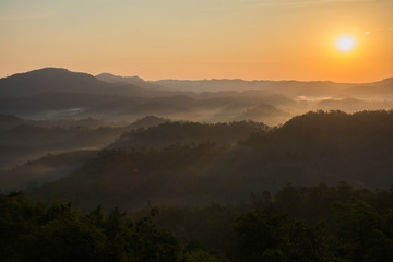 A picture of beautiful sky and cover foggy of layer mountain before sunrise, Thailand.