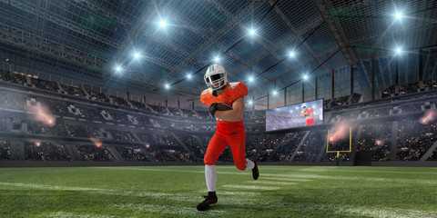 American football players in professional sport stadium.