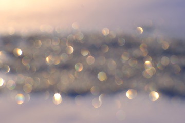 Blurry abstract gray background with bokeh lights